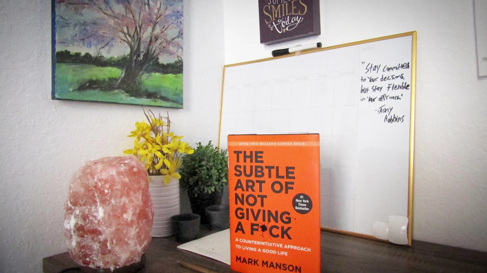 The orange cover of The Subtle Art of Not Giving a F*ck by Mark Manson.